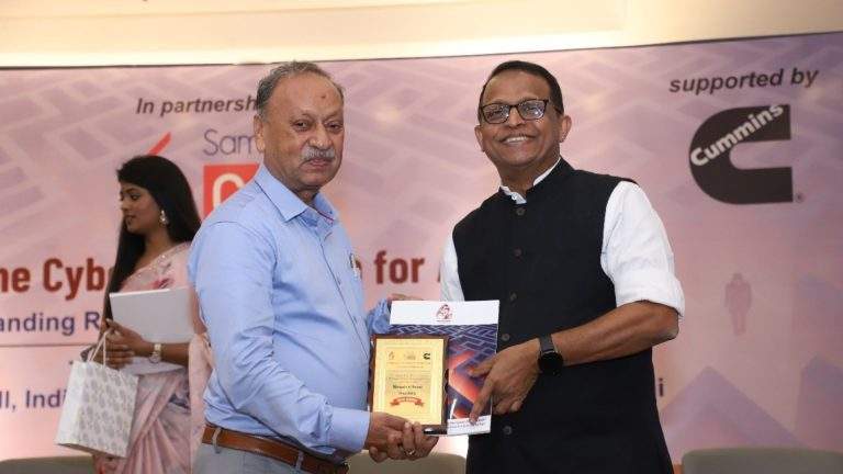 Dr. K C George