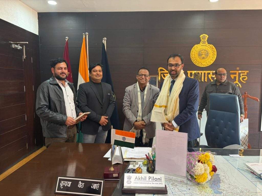 Adv. Dr. K. C. George meeting Deputy Commissioner Nuh Shri Akhil Pilani IAS